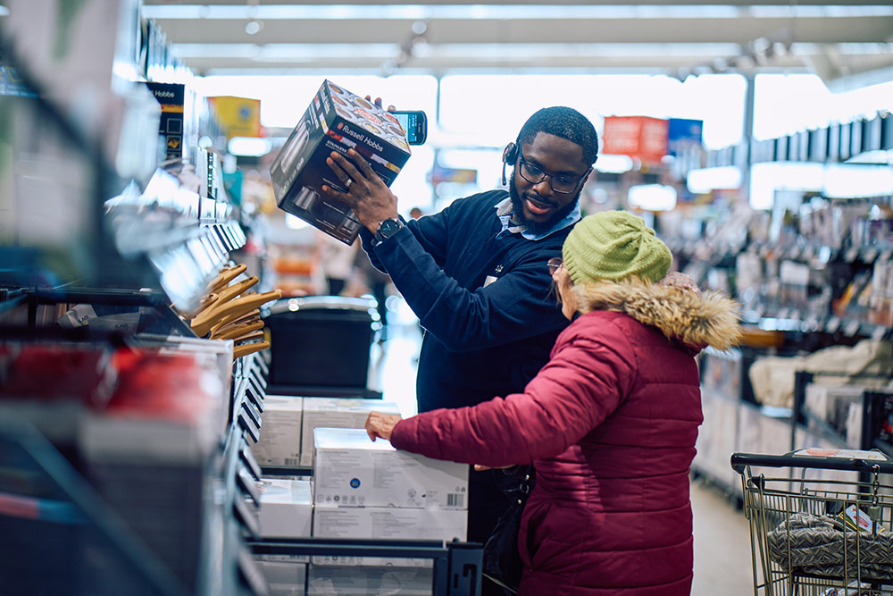 Lidl staff and customer